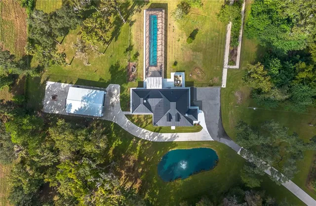 a view of a mirror with washer and dryer