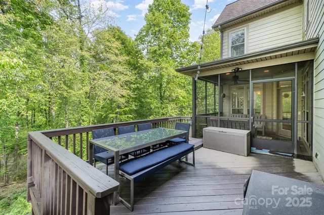 a wooden bench sitting in front of a building