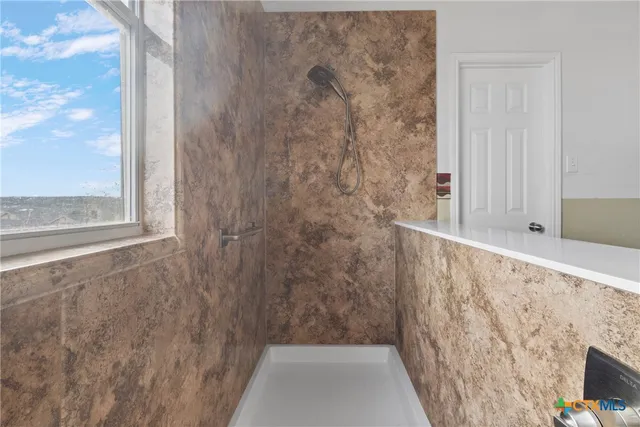 a view of a bathroom with a shower