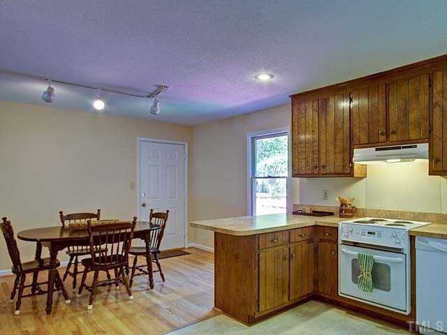 805 Bluestone Road Durham, NC 27713 - Photo 11 of 23 Wooden cabinetry, good counter space.
