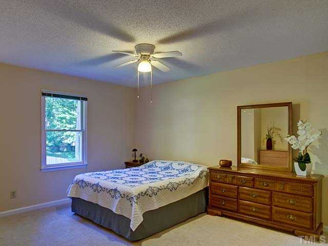 805 Bluestone Road Durham, NC 27713 - Photo 13 of 23 Master bedroom faces rear of home.
