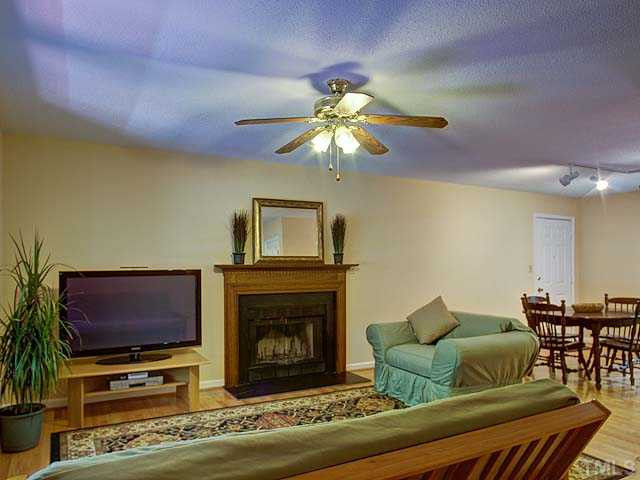 805 Bluestone Road Durham, NC 27713 - Photo 8 of 23 Living opens to dining area.