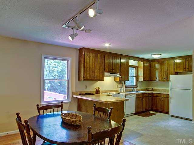 805 Bluestone Road Durham, NC 27713 - Photo 9 of 23 Spacious kitchen is fully applianced.