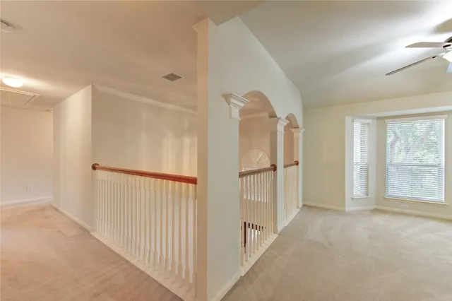 a view of a hallway with closet area