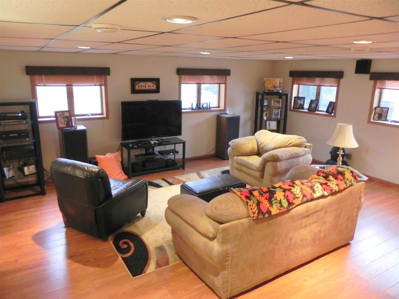 232 Lake Summerset Road Lake Summerset, IL 61019 - Photo 12 of 24 a living room with furniture and a flat screen tv