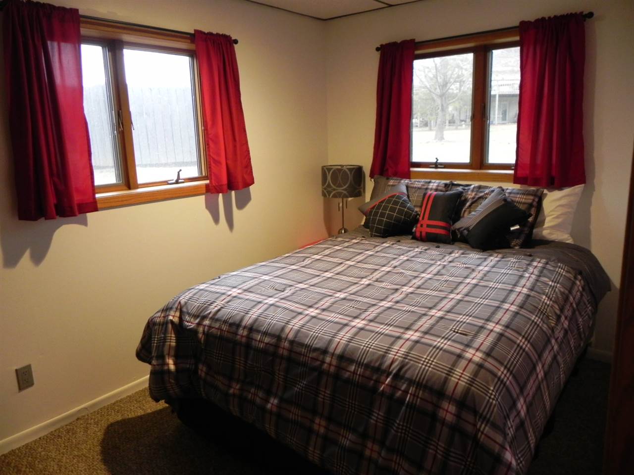 232 Lake Summerset Road Lake Summerset, IL 61019 - Photo 17 of 24 a bedroom with a bed and window