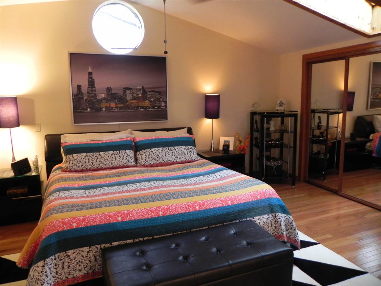 232 Lake Summerset Road Lake Summerset, IL 61019 - Photo 20 of 24 a bedroom with bed and wooden floor