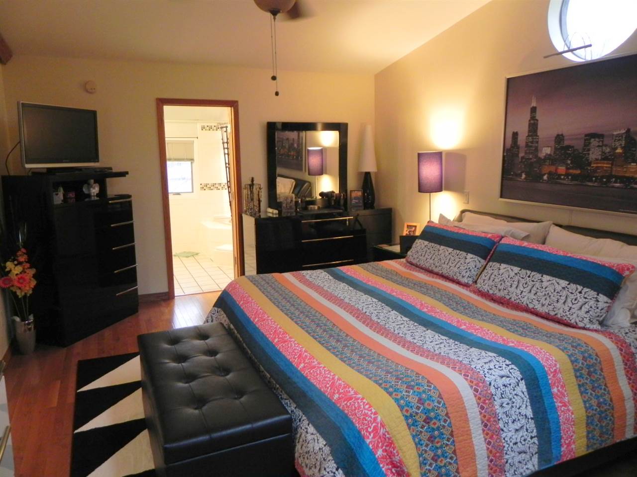 232 Lake Summerset Road Lake Summerset, IL 61019 - Photo 21 of 24 a bedroom with a bed and a television