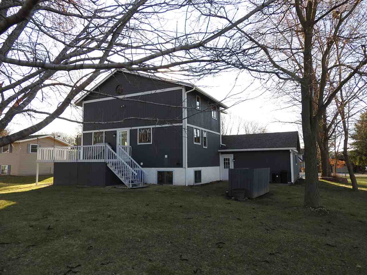 232 Lake Summerset Road Lake Summerset, IL 61019 - Photo 24 of 24 a front view of house with yard and trees in the background