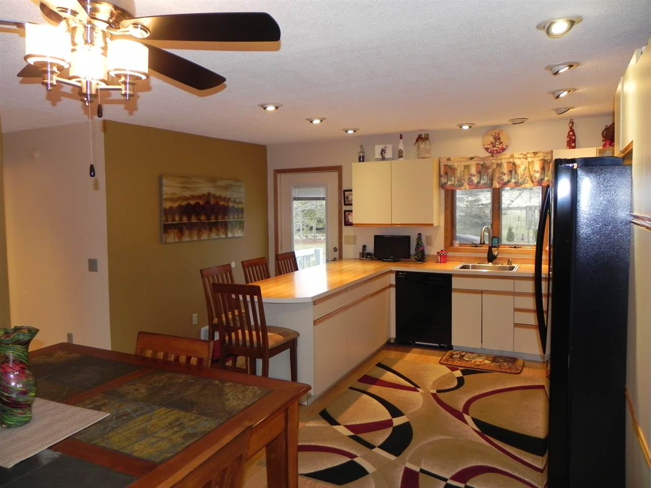232 Lake Summerset Road Lake Summerset, IL 61019 - Photo 5 of 24 a kitchen with a sink appliances and cabinets