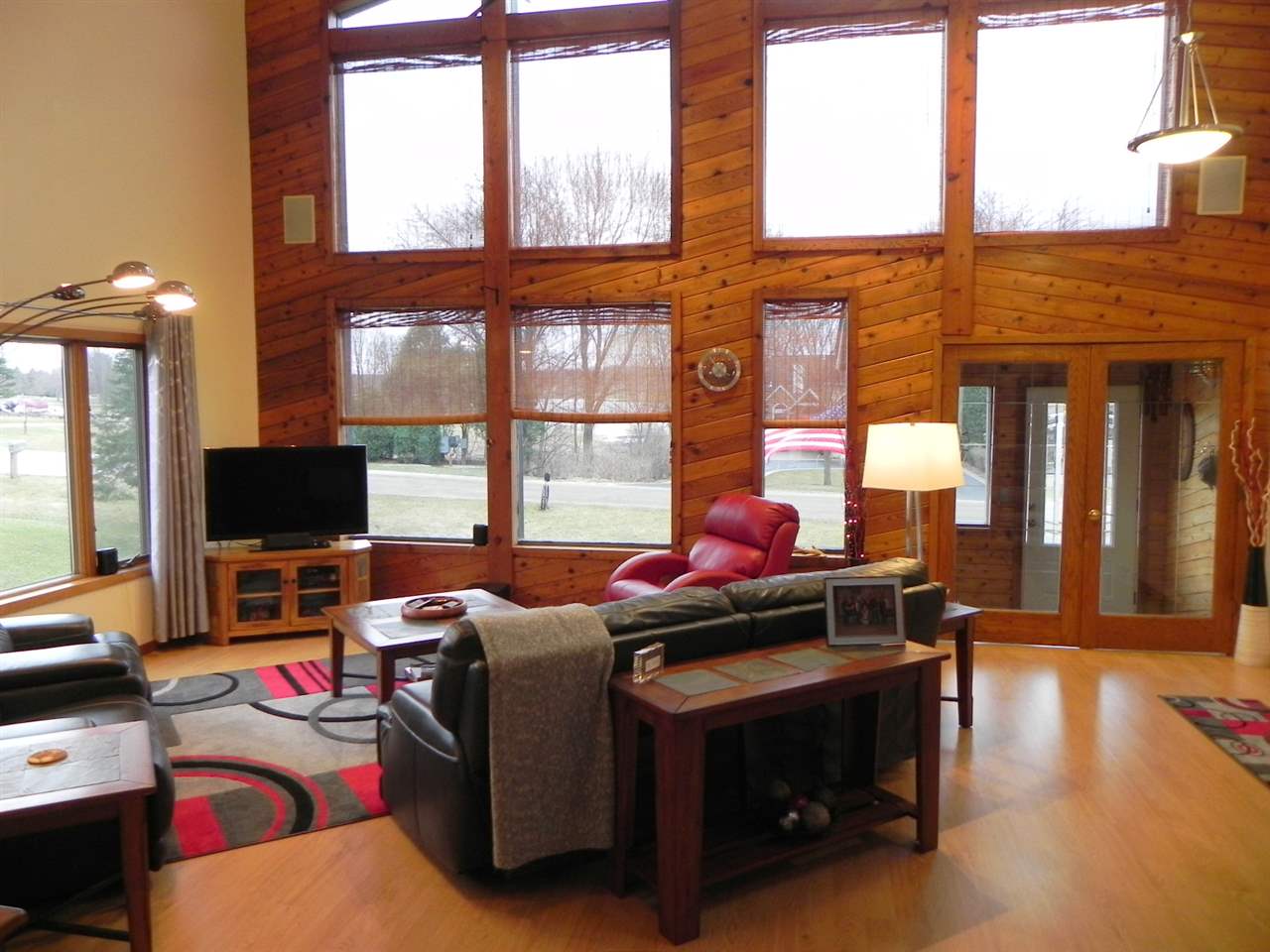 232 Lake Summerset Road Lake Summerset, IL 61019 - Photo 8 of 24 a living room with furniture and a flat screen tv