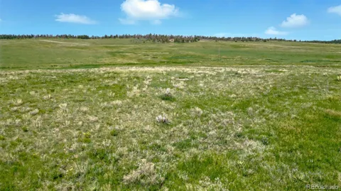 a view of an ocean and sunset