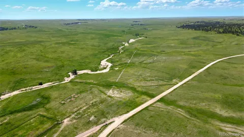 a view of a lake from a balcony