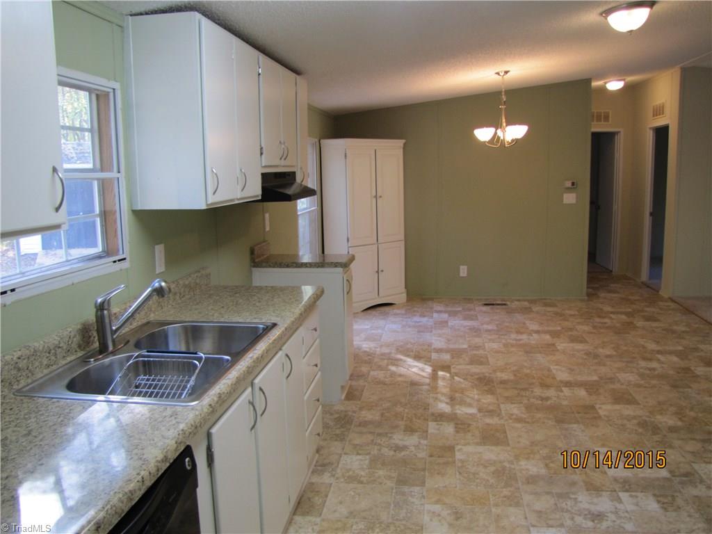1085 Fagg Farm Road Walnut Cove, NC 27052 - Photo 7 of 24 Looking into the DR.