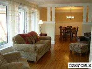 4101 Sharon View Road Charlotte, NC 28226 - Photo 3 of 8 a living room with furniture and a large window