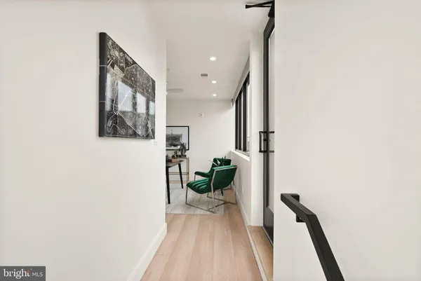 a living room with furniture fireplace and flat screen tv