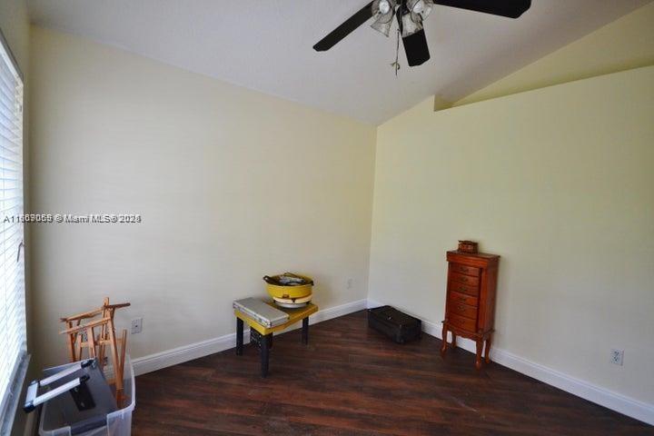 17569 North 89th Place North Loxahatchee, FL 33470 - Photo 18 of 24 a view of sitting area with furniture and wooden floor