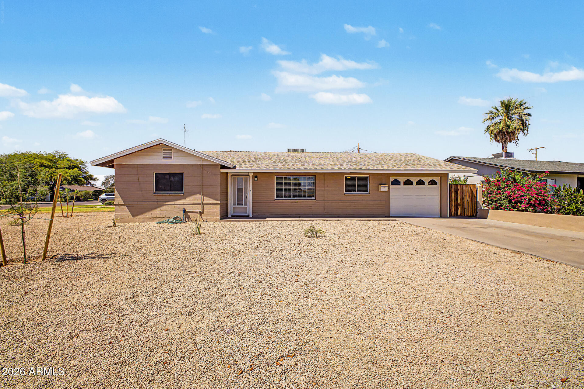 2022 East Monterey Way Phoenix, AZ 85016 - Photo 1 of 29 a front view of a house with a yard