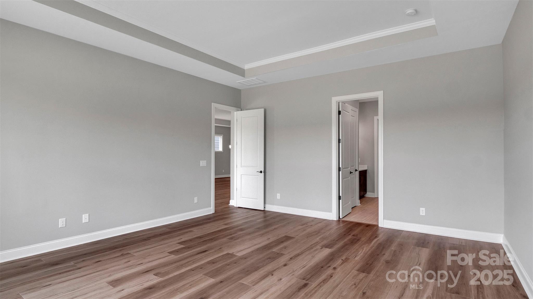 1031 Rabbit Hl Lane Monroe, NC 28110 - Photo 12 of 47 a view of an empty room and wooden floor