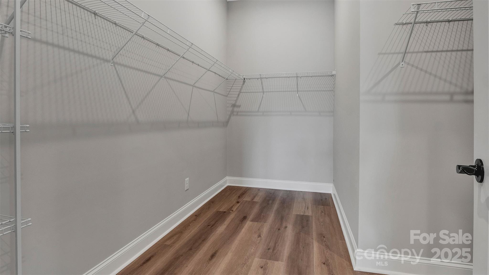 1031 Rabbit Hl Lane Monroe, NC 28110 - Photo 17 of 47 a view of a room with racks on the wall