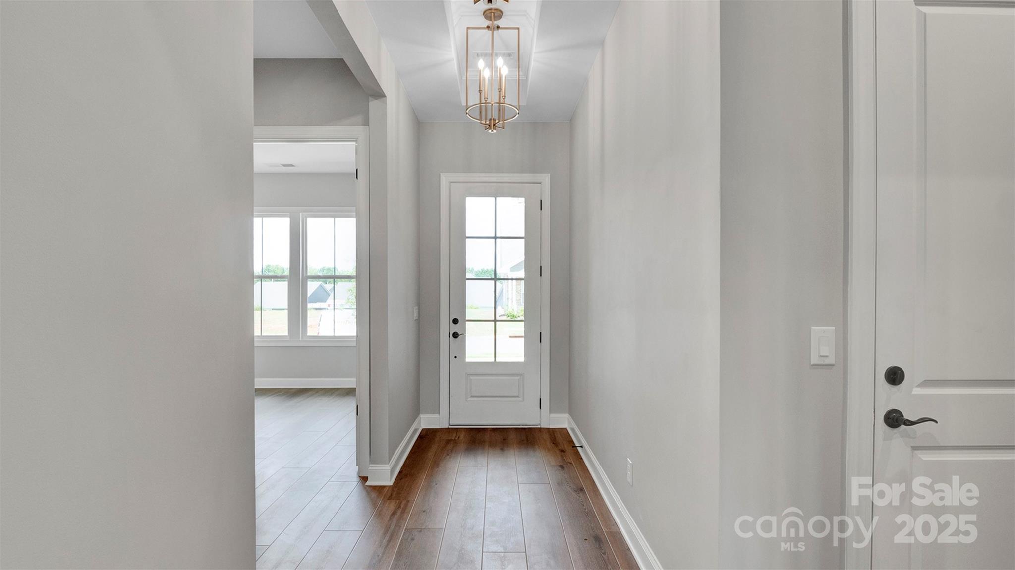 1031 Rabbit Hl Lane Monroe, NC 28110 - Photo 3 of 47 a view of livingroom with hardwood floor and window