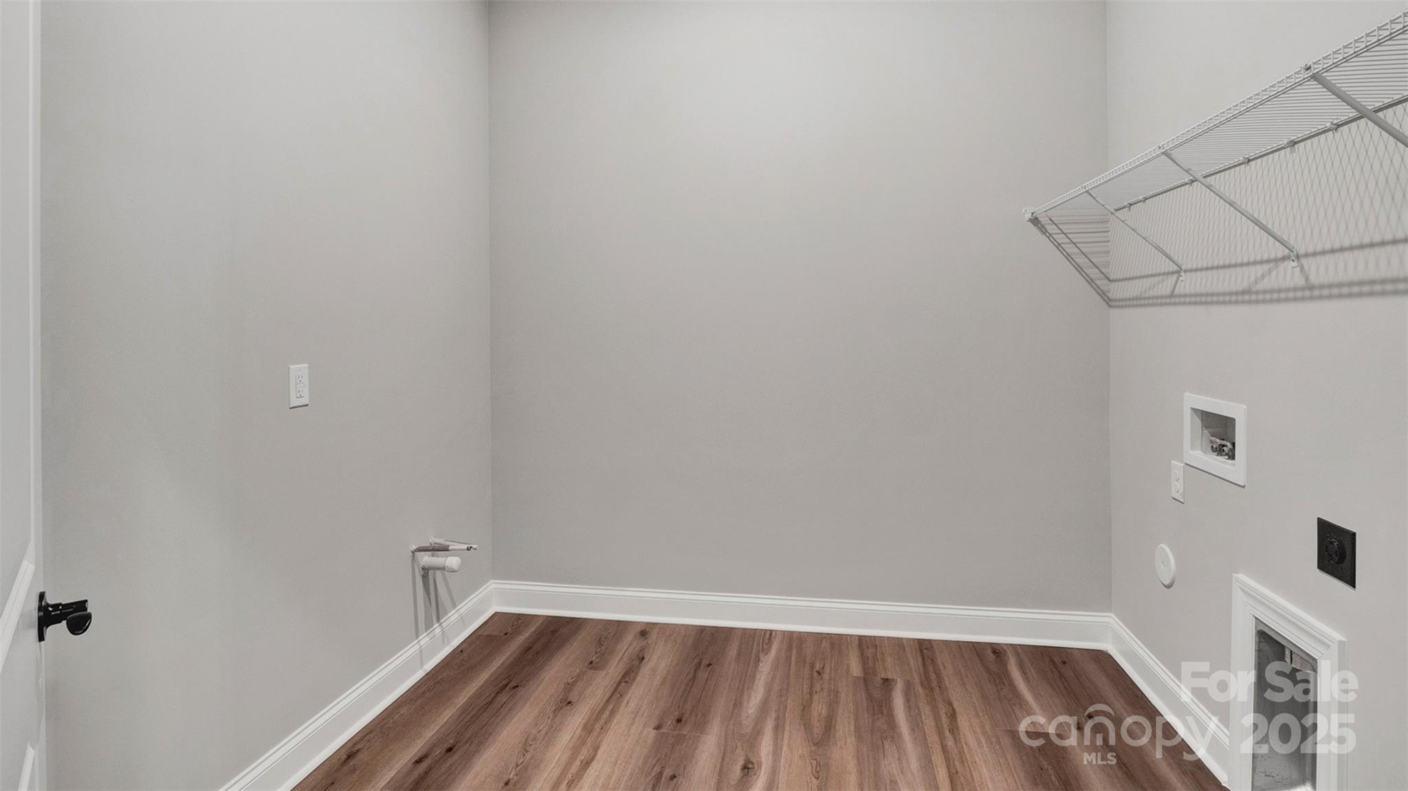 1031 Rabbit Hl Lane Monroe, NC 28110 - Photo 33 of 47 a view of a room with wooden floor and white walls
