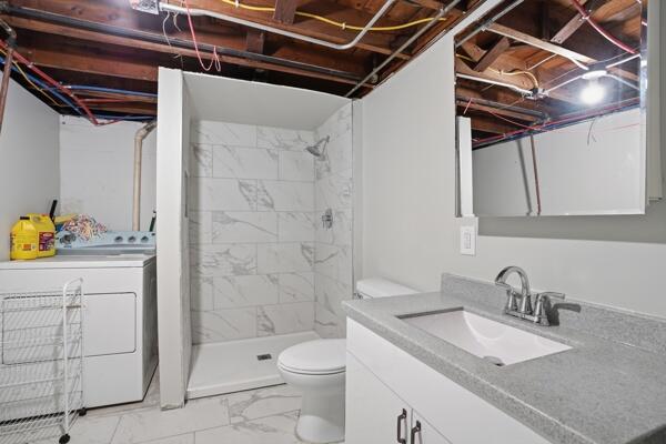 263 Taft Street Gary, IN 46404 - Photo 12 of 13 a bathroom with a granite countertop sink toilet and shower