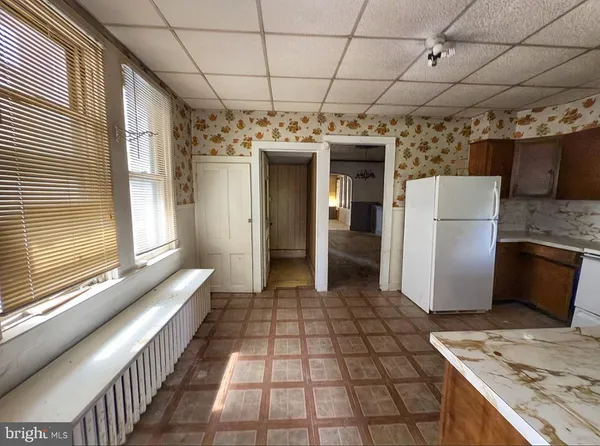 a view of hallway with windows