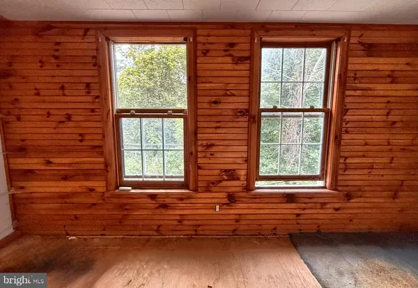 a view of front door of a house with a window