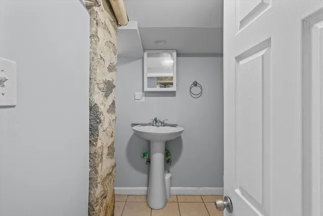a bathroom with a sink and toilet