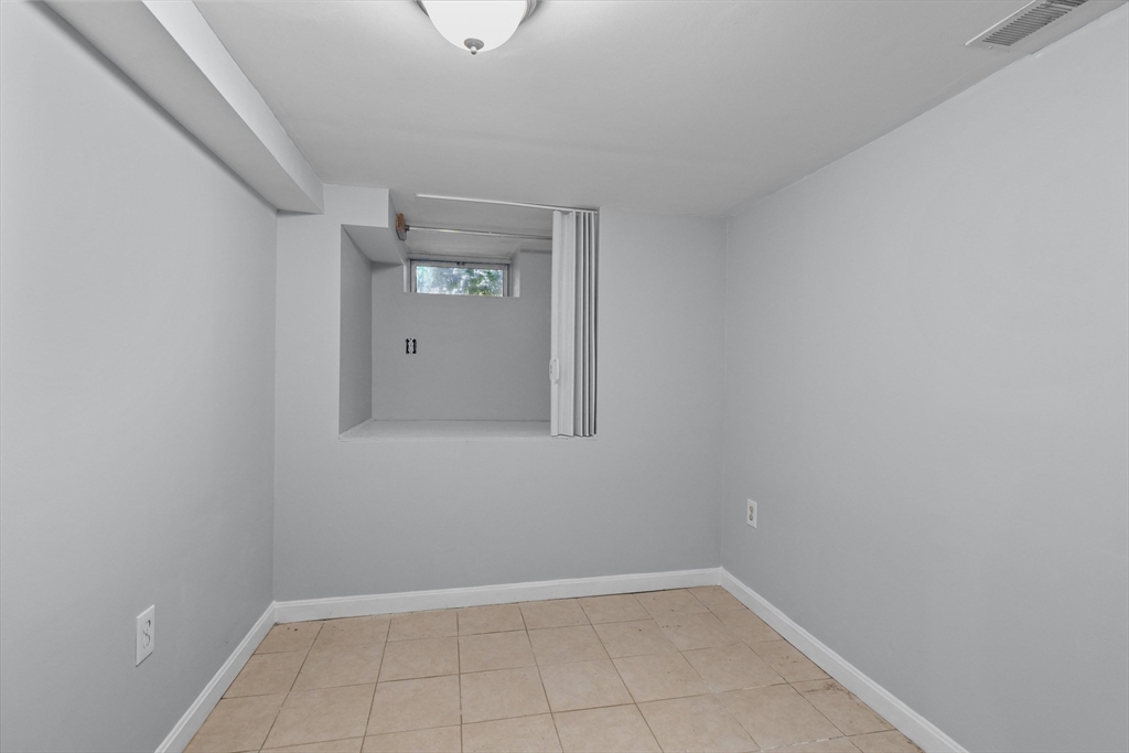81 5th Avenue Lowell, MA 01854 - Photo 20 of 35 a view of an empty room