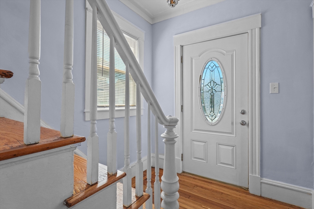 81 5th Avenue Lowell, MA 01854 - Photo 4 of 35 a view of front door with stairs