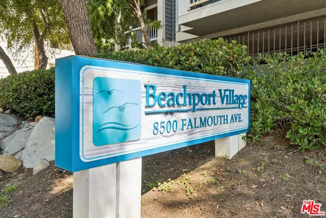 a sign that is on a brick wall