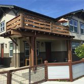 a view of a house with entrance gate