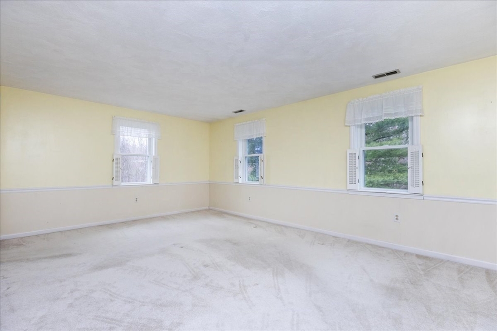22 Collins Street, Unit 46 Danvers, MA 01923 - Photo 27 of 37 an empty room with windows