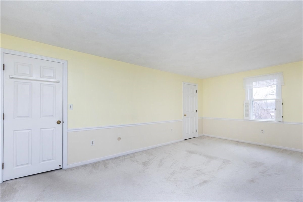 22 Collins Street, Unit 46 Danvers, MA 01923 - Photo 28 of 37 an empty room with a window