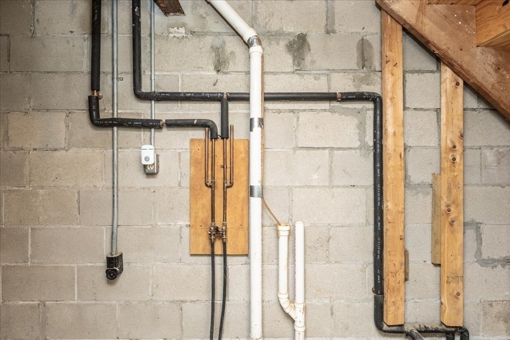 22 Collins Street, Unit 46 Danvers, MA 01923 - Photo 31 of 37 a bathroom with a shower