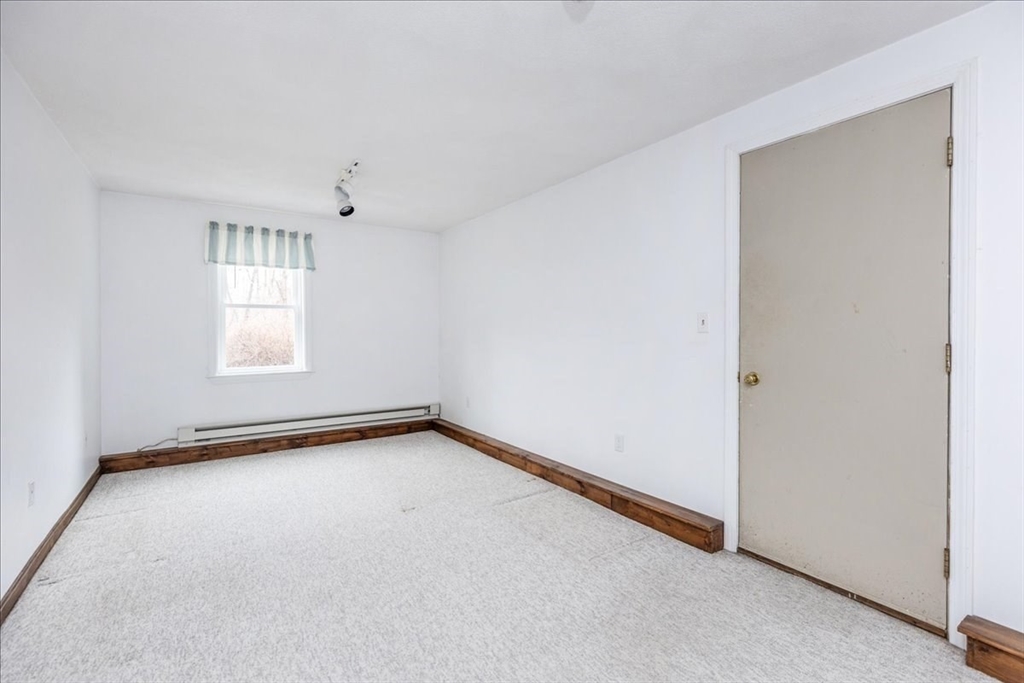 22 Collins Street, Unit 46 Danvers, MA 01923 - Photo 33 of 37 an empty room with windows