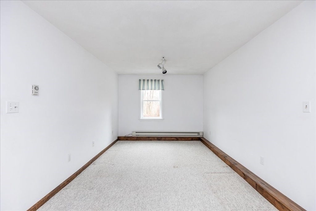 22 Collins Street, Unit 46 Danvers, MA 01923 - Photo 34 of 37 an empty room with a window