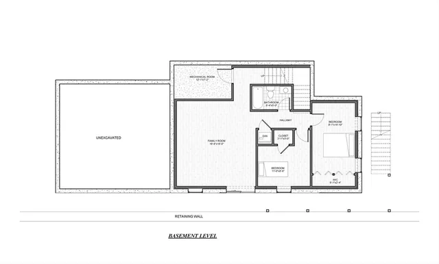 a black and white photo of a living room