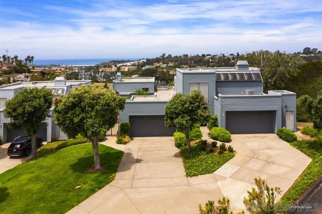 1031 America Way Del Mar, CA 92014 - Photo 23 of 25 a view of a terrace with a garden