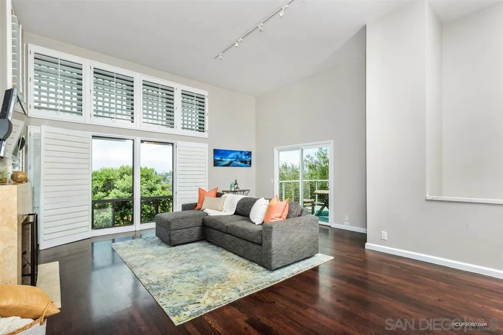 1031 America Way Del Mar, CA 92014 - Photo 3 of 25 a living room with furniture and a large window