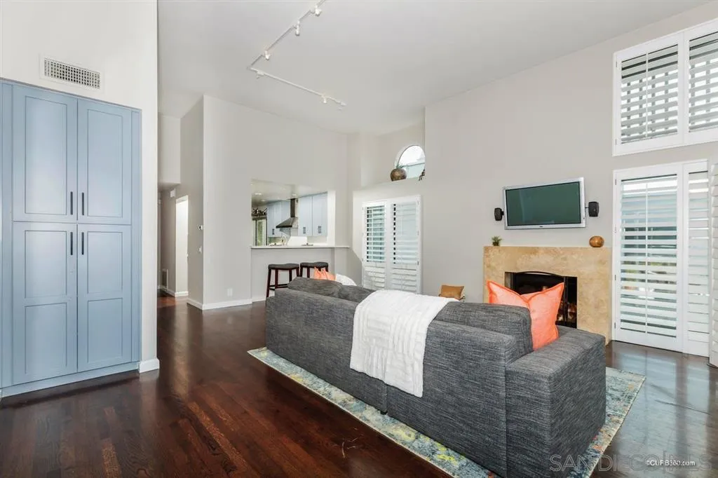 1031 America Way Del Mar, CA 92014 - Photo 7 of 25 a living room with fireplace furniture and a flat screen tv