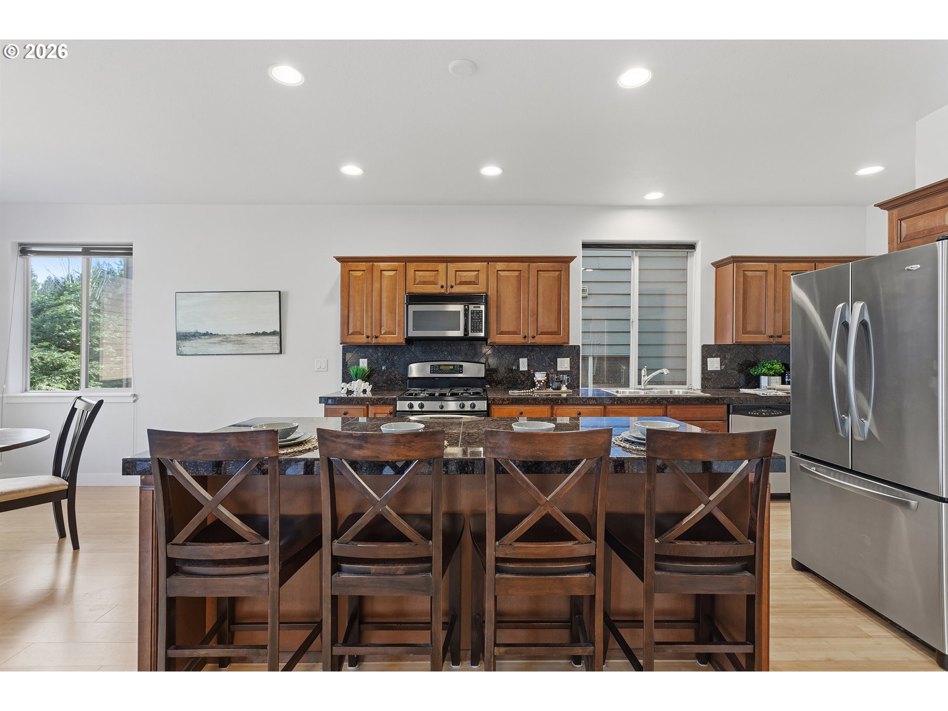 2502 Northwest Parnell Terrace Portland, OR 97229 - Photo 19 of 48 a view of a dining room with furniture