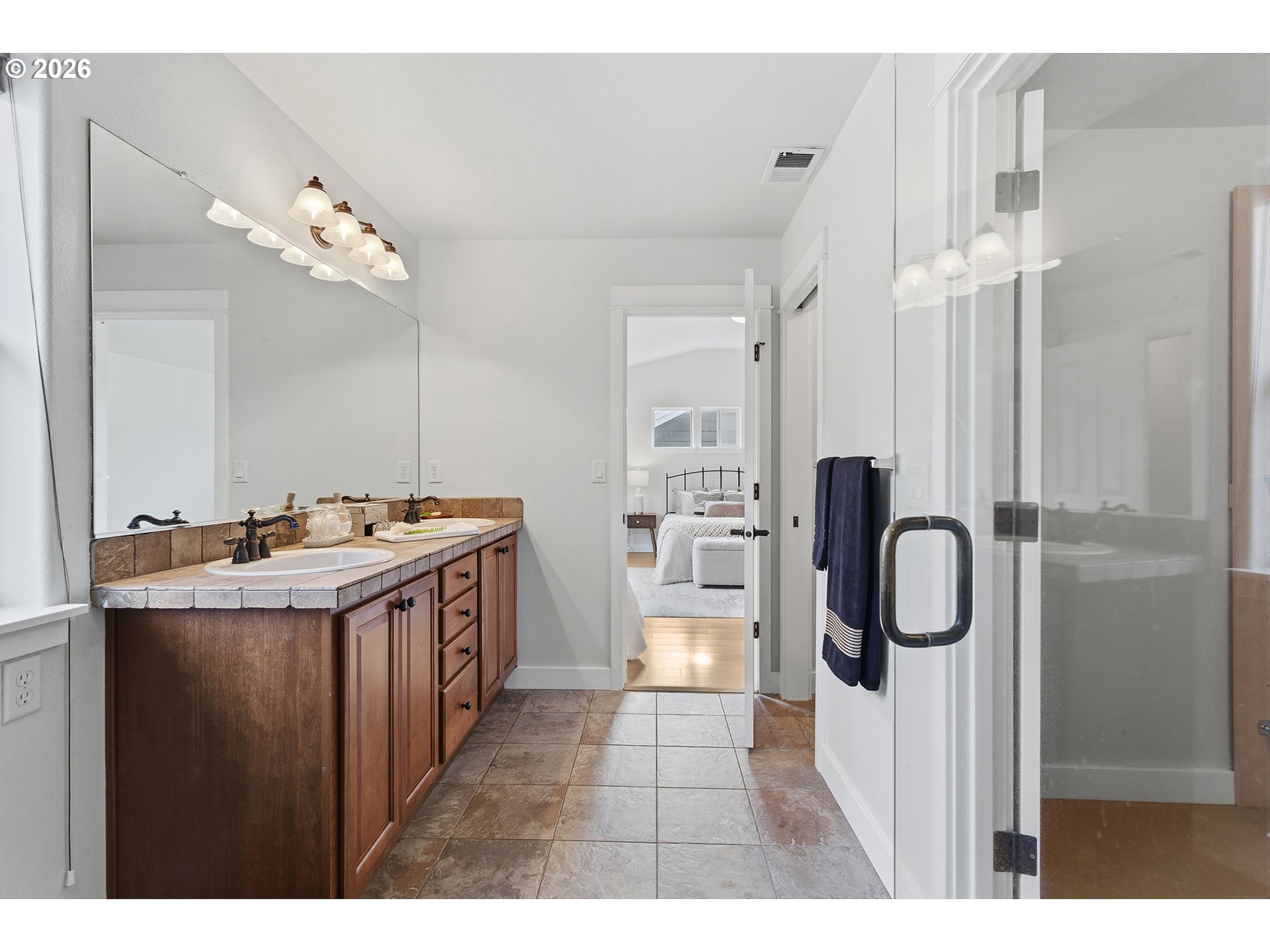 2502 Northwest Parnell Terrace Portland, OR 97229 - Photo 30 of 48 a kitchen with kitchen island a sink and refrigerator