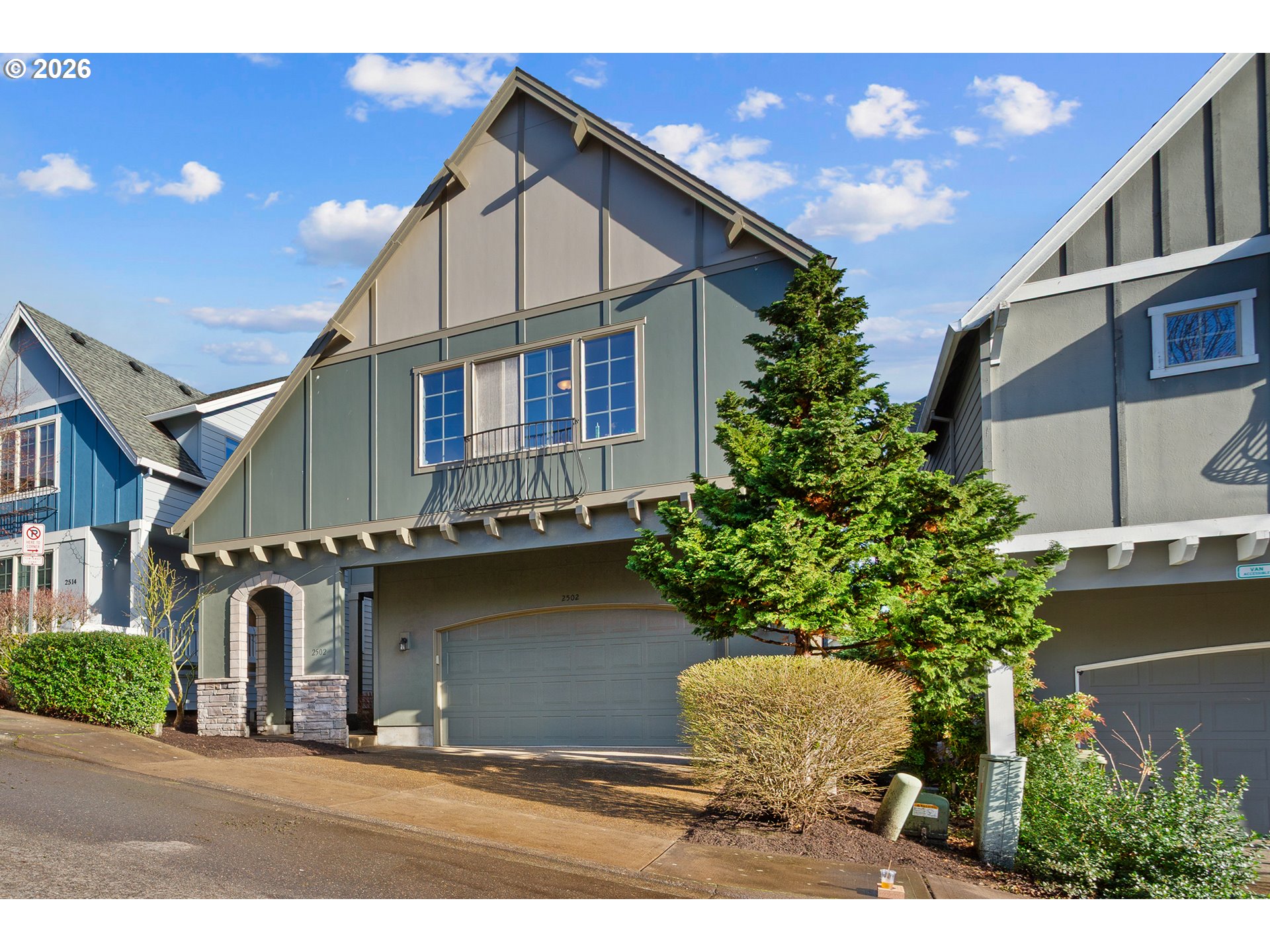 2502 Northwest Parnell Terrace Portland, OR 97229 - Photo 3 of 48 a house with lots of trees in the background