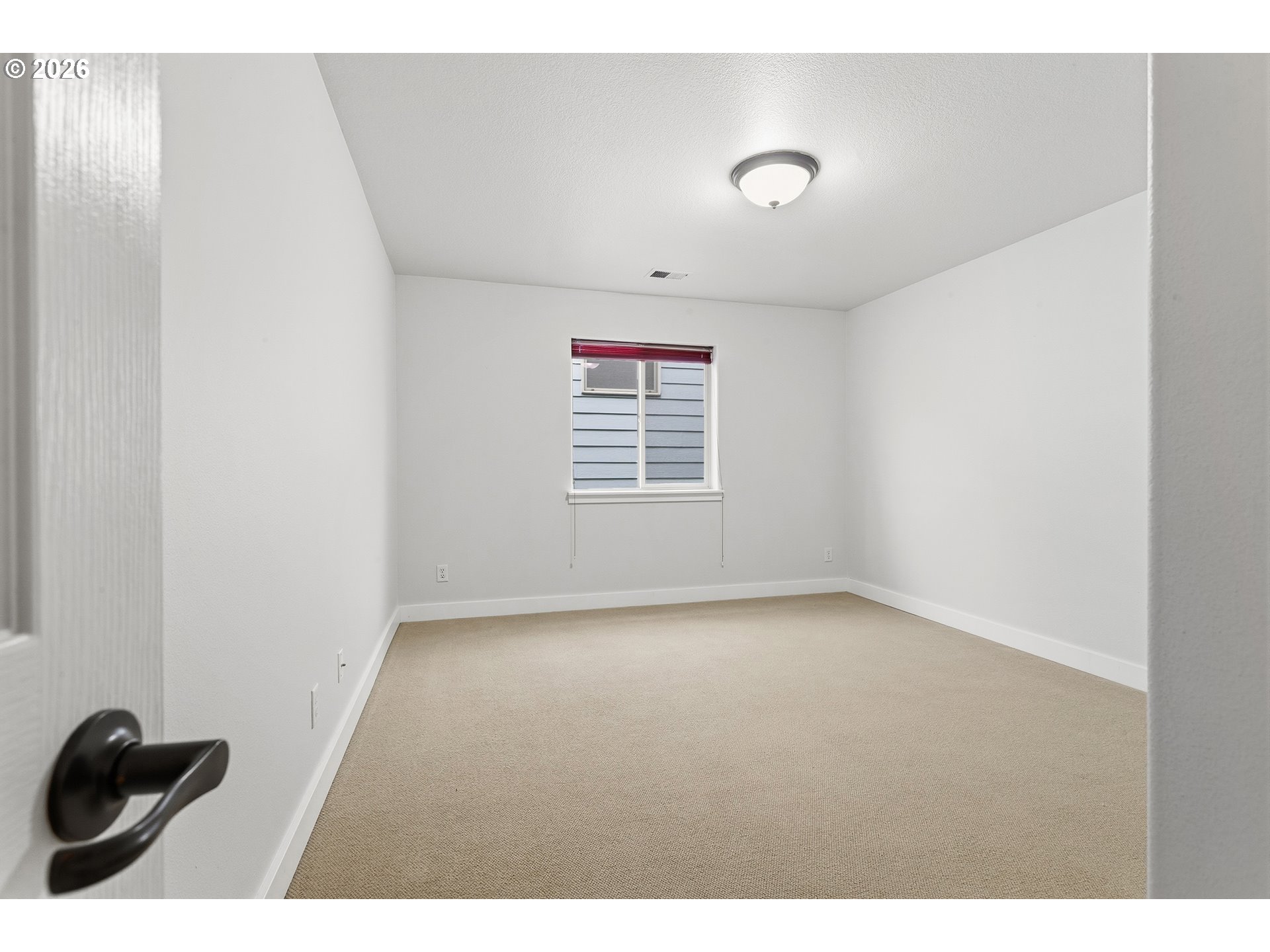 2502 Northwest Parnell Terrace Portland, OR 97229 - Photo 33 of 48 a view of an empty room with a window
