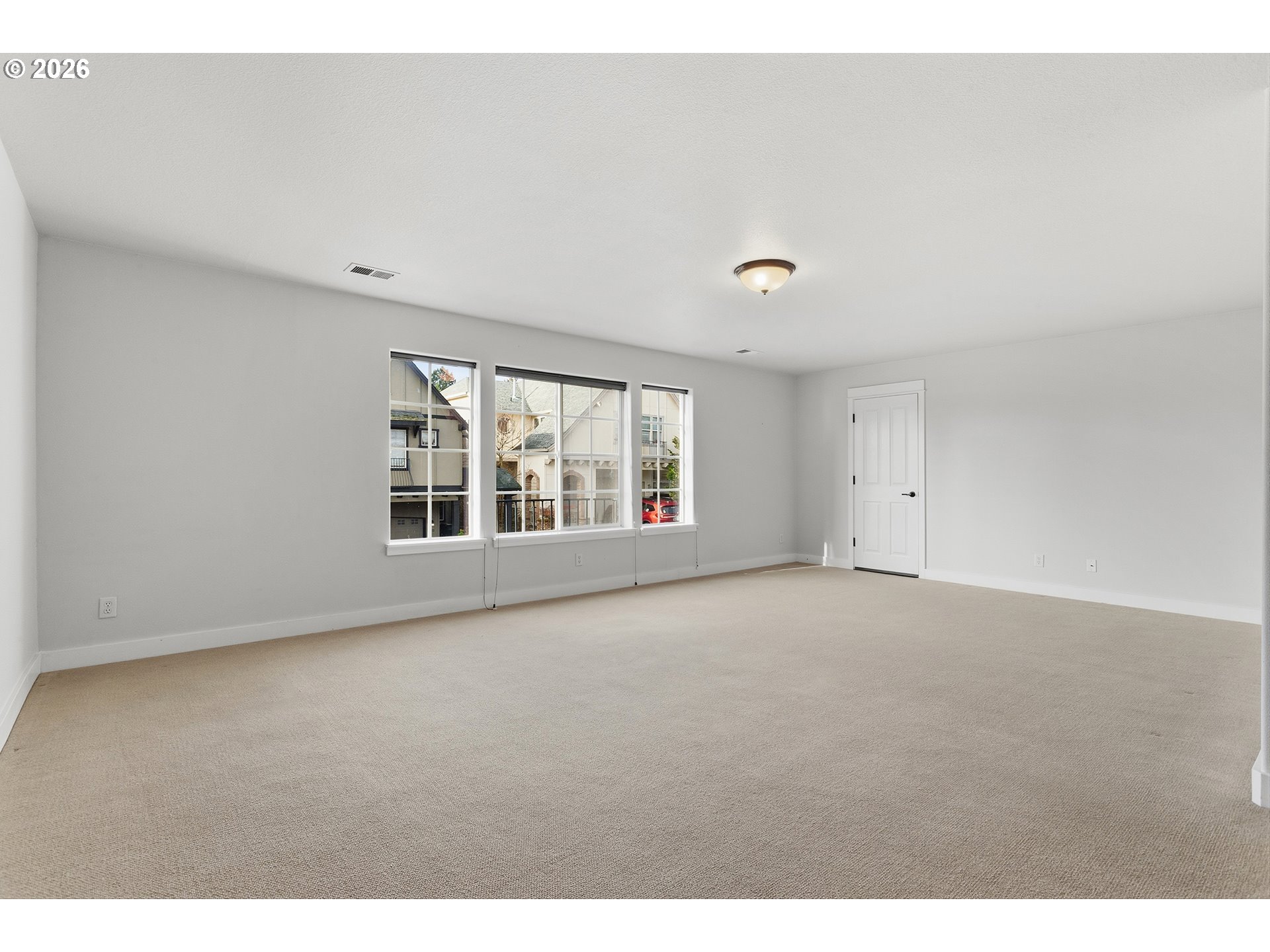 2502 Northwest Parnell Terrace Portland, OR 97229 - Photo 42 of 48 a view of an empty room with a window