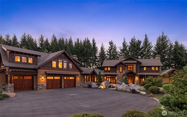 a front view of a residential apartment building with a yard