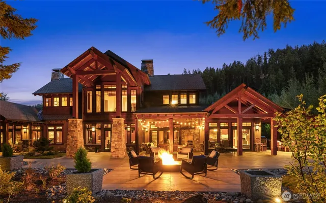 a front view of a residential apartment building with a yard